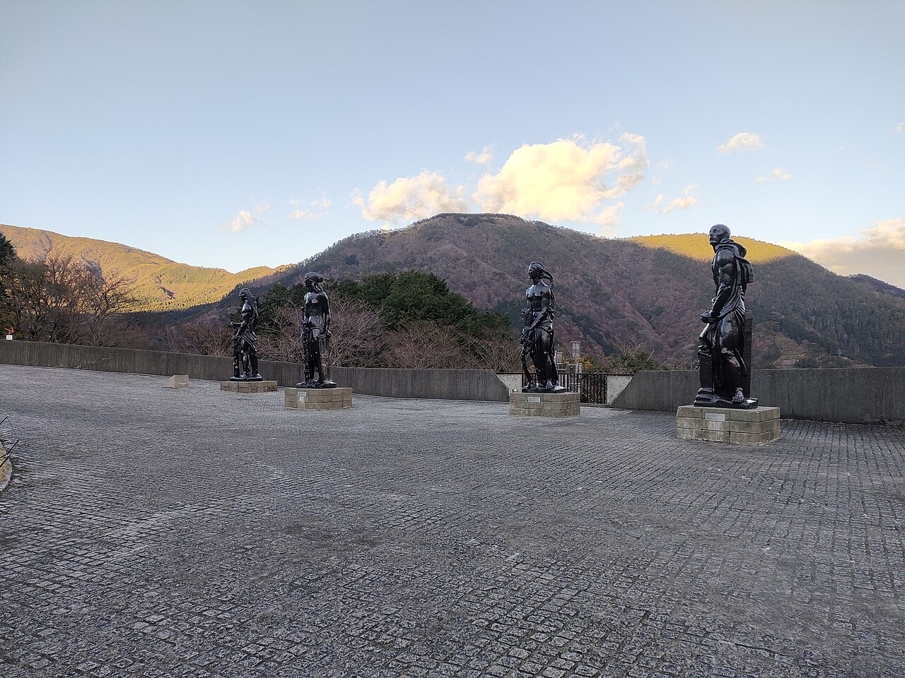 Auguste Rodin's 'The Thinker' sculpture displayed outdoors at Hakone Open Air Museum.