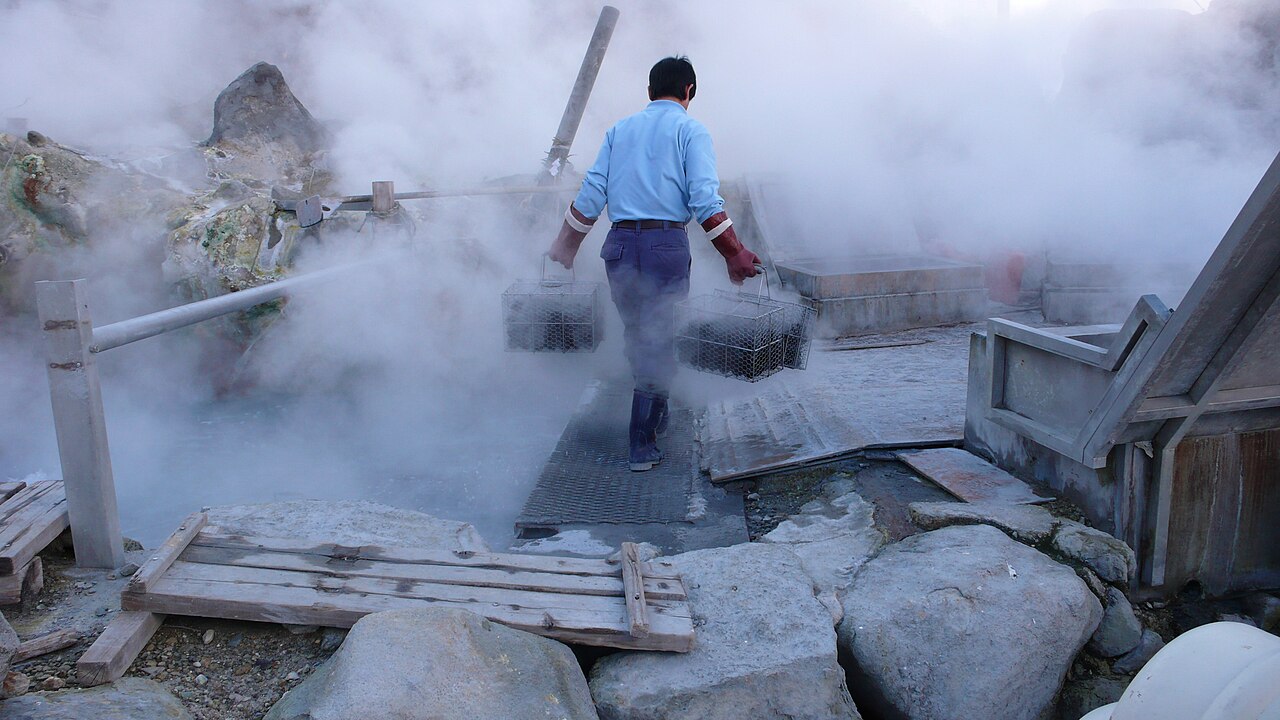 Baskets of black eggs being boiled in the sulfurous hot springs at Owakudani
