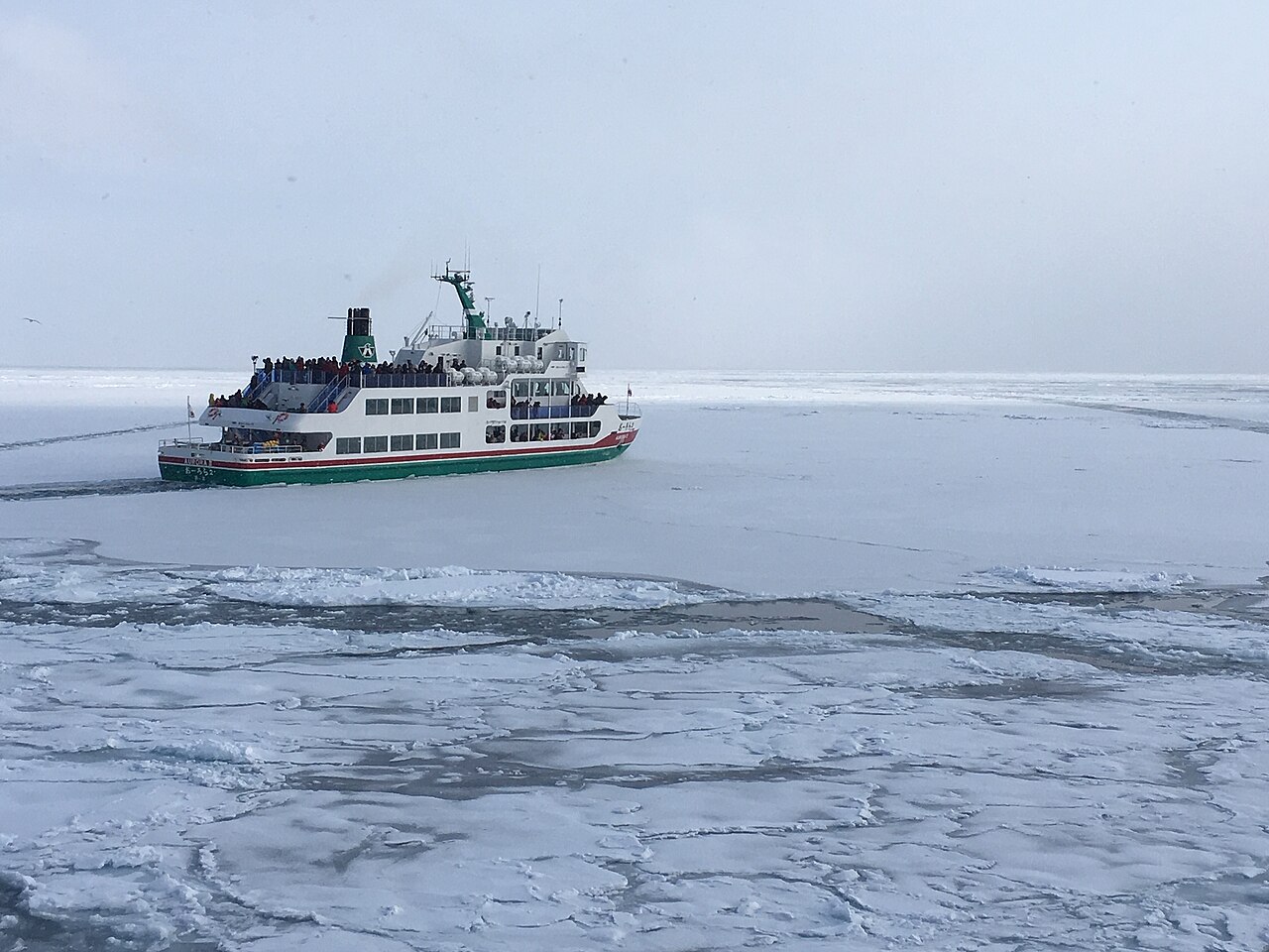 Icebreaker ship navigating through drift ice off the coast of Abashiri, Hokkaido
