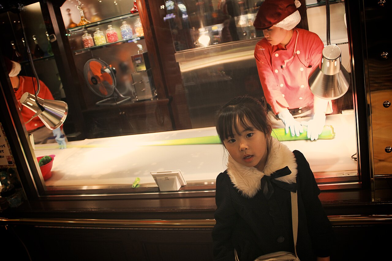 Children decorating cookies during a workshop at Shiroi Koibito Park.