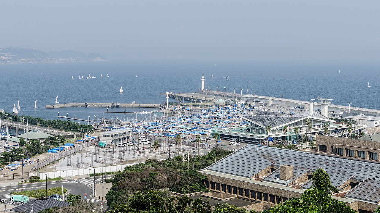 A panoramic view of Enoshima Island with its iconic bridge connecting to the mainland