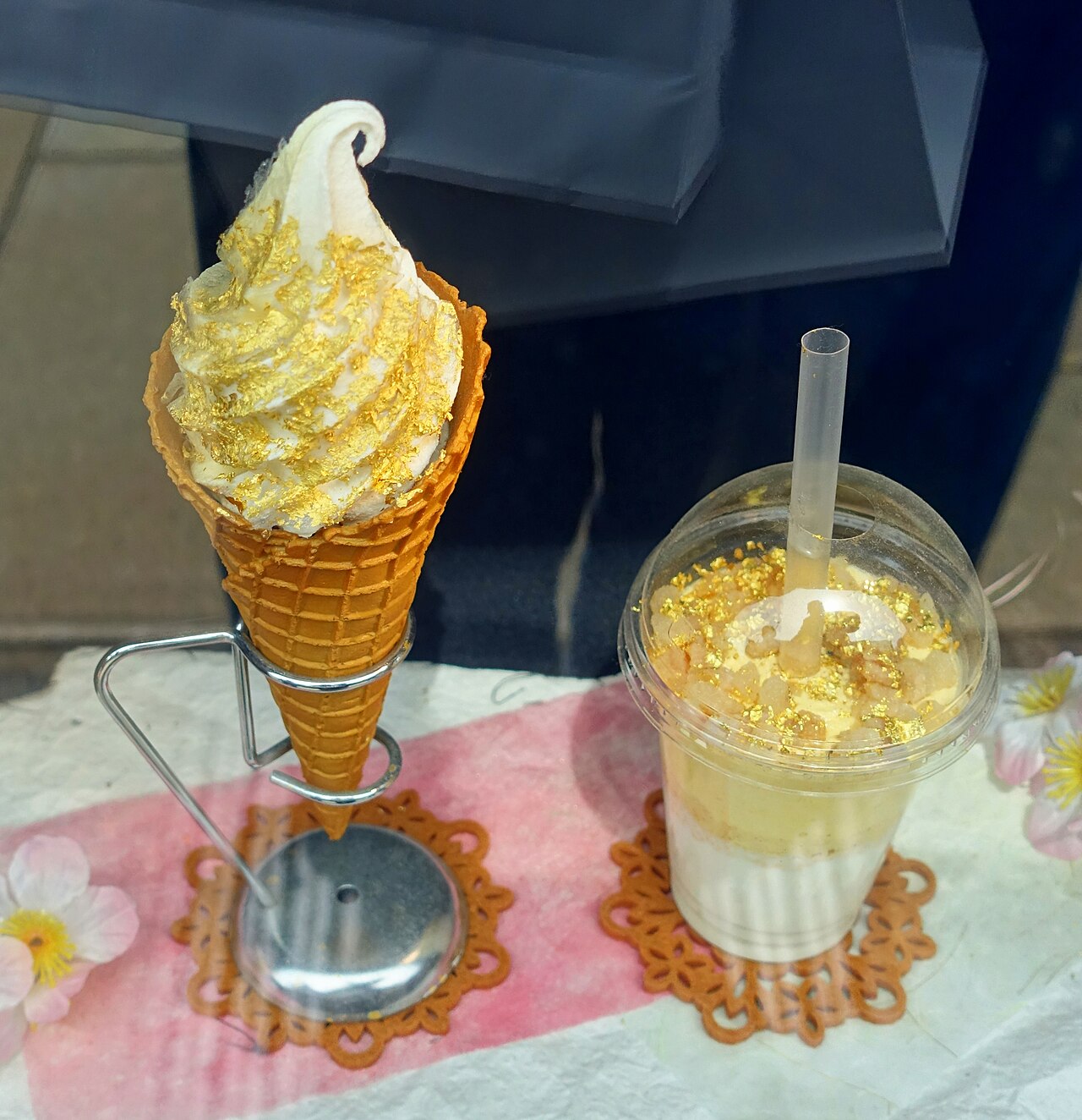 Soft serve ice cream topped with a sheet of edible gold leaf, a Kanazawa specialty