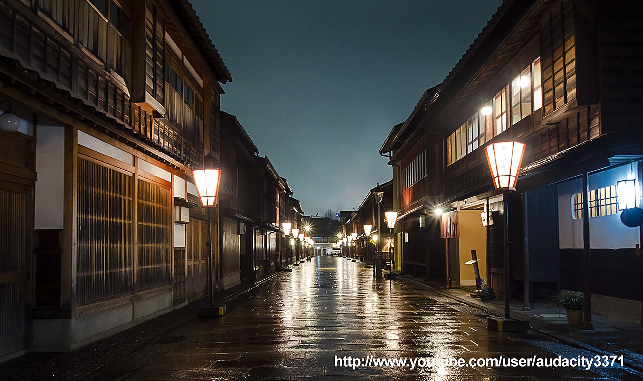 Higashi Chaya District at dusk with traditional wooden buildings and lanterns glowing