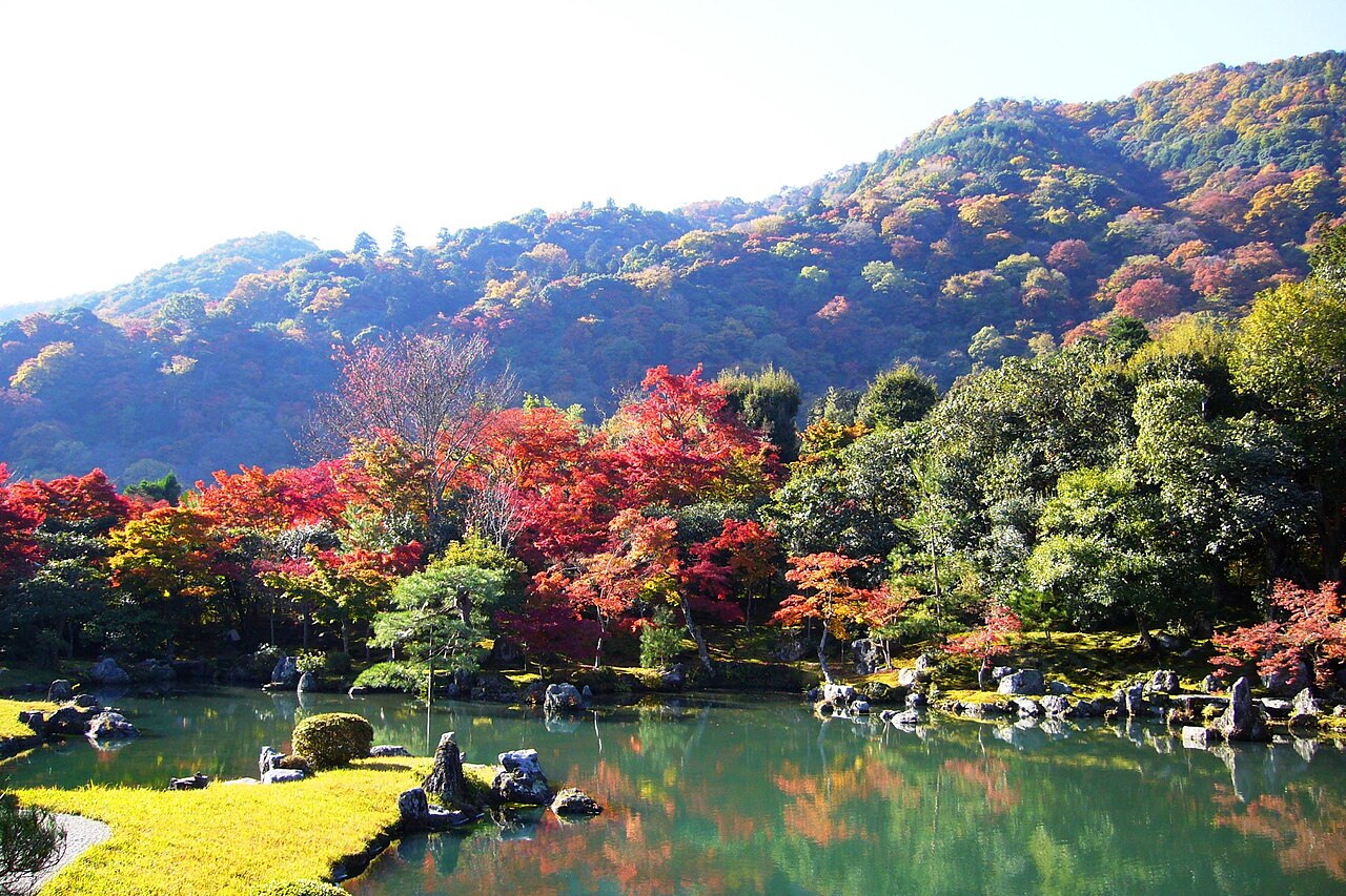 The serene Sogenchi Teien garden at Tenryu-ji temple with its central pond and surrounding landscape