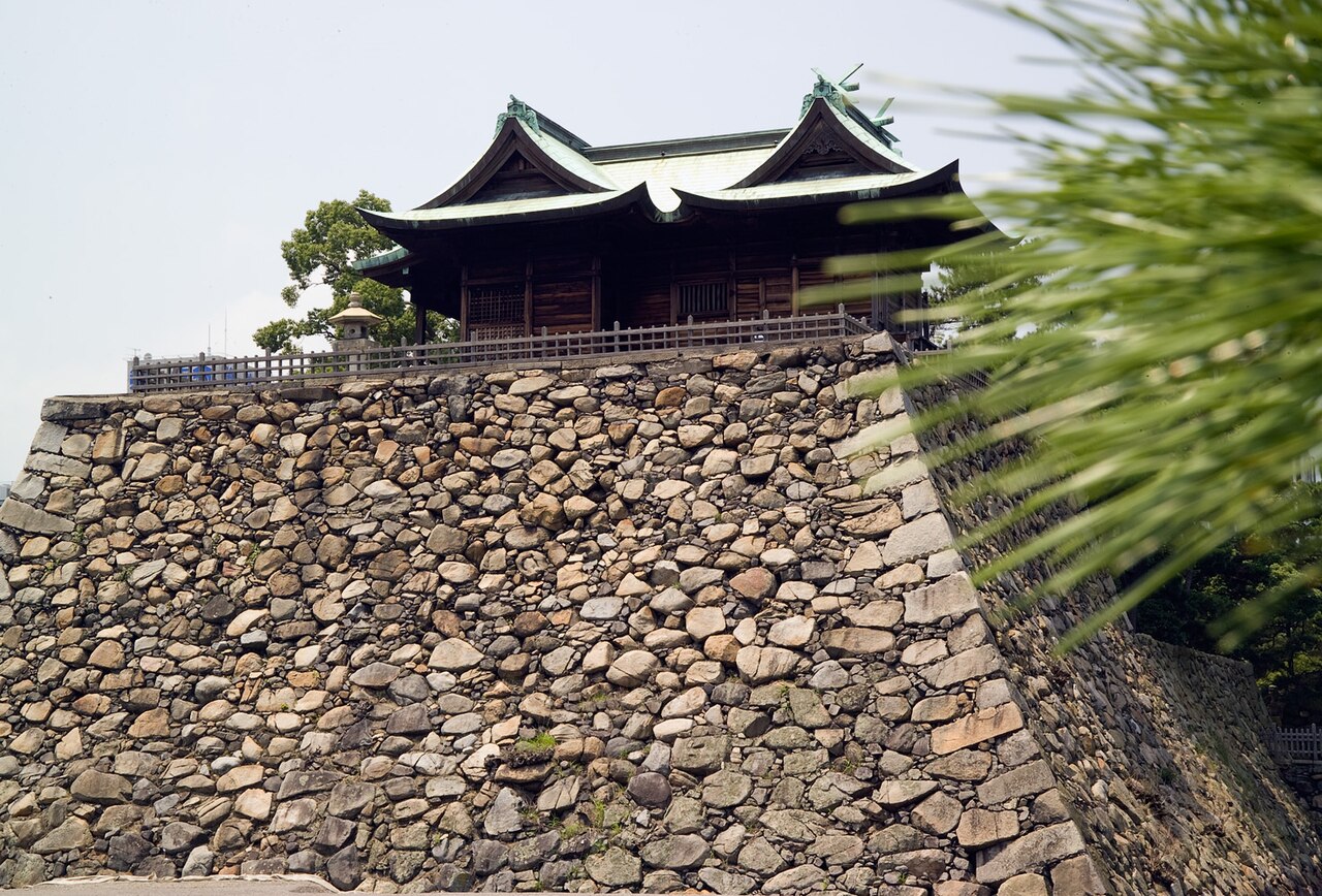 The stone base of the former Nijo Castle keep (Tenshu-dai), offering panoramic views of the castle grounds.