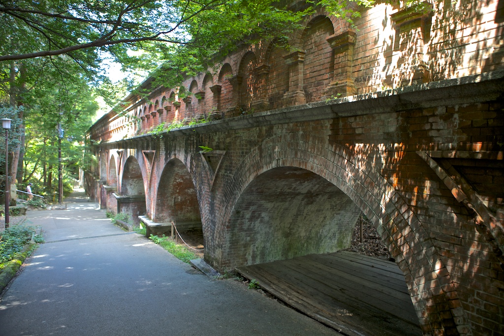 The historic brick aqueduct, part of the Nanzen-ji Temple complex in Kyoto, blending ancient and modern engineering.