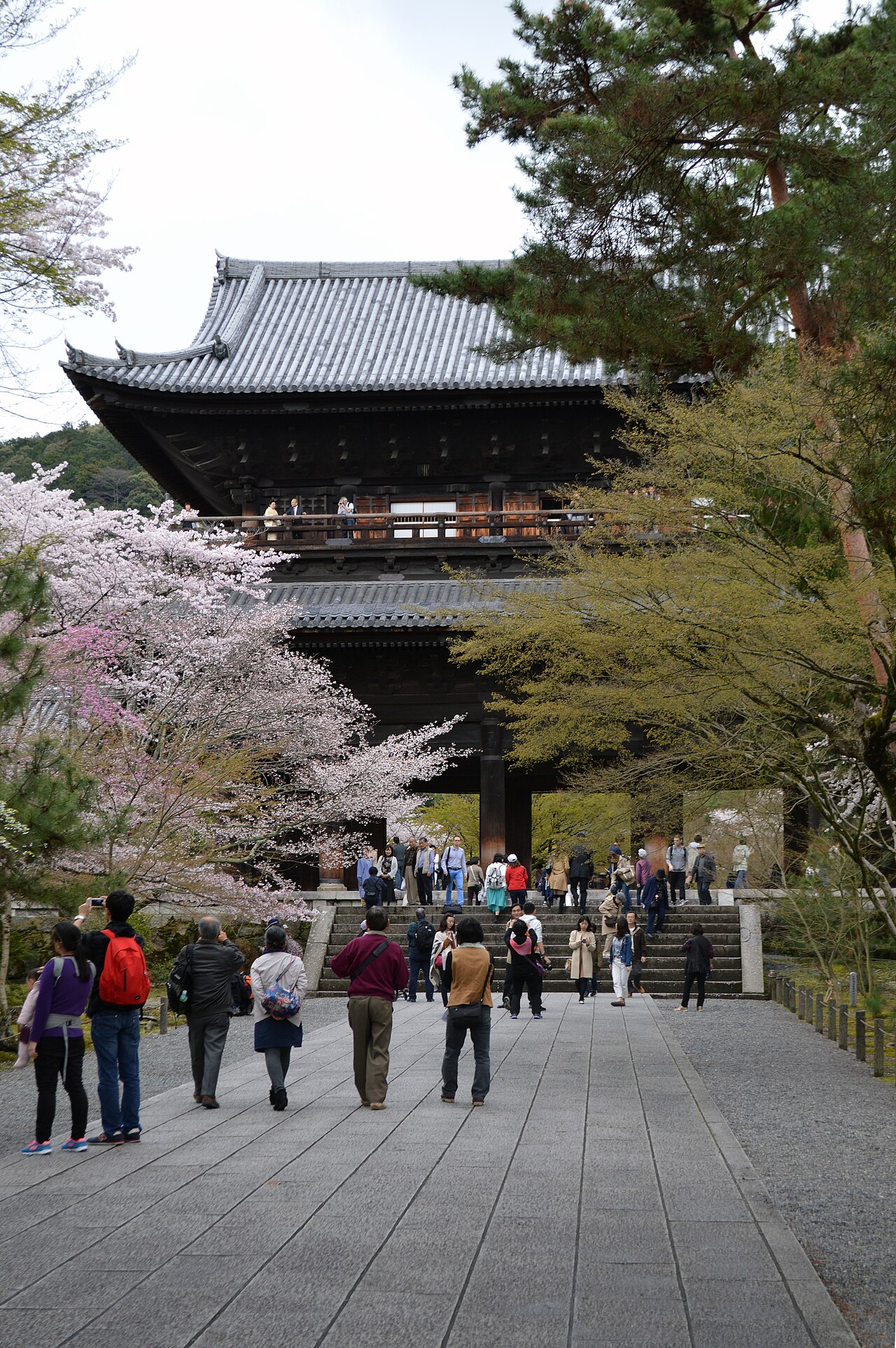 The imposing wooden Sanmon gate of Nanzen-ji Temple, a large two-story structure with intricate details.