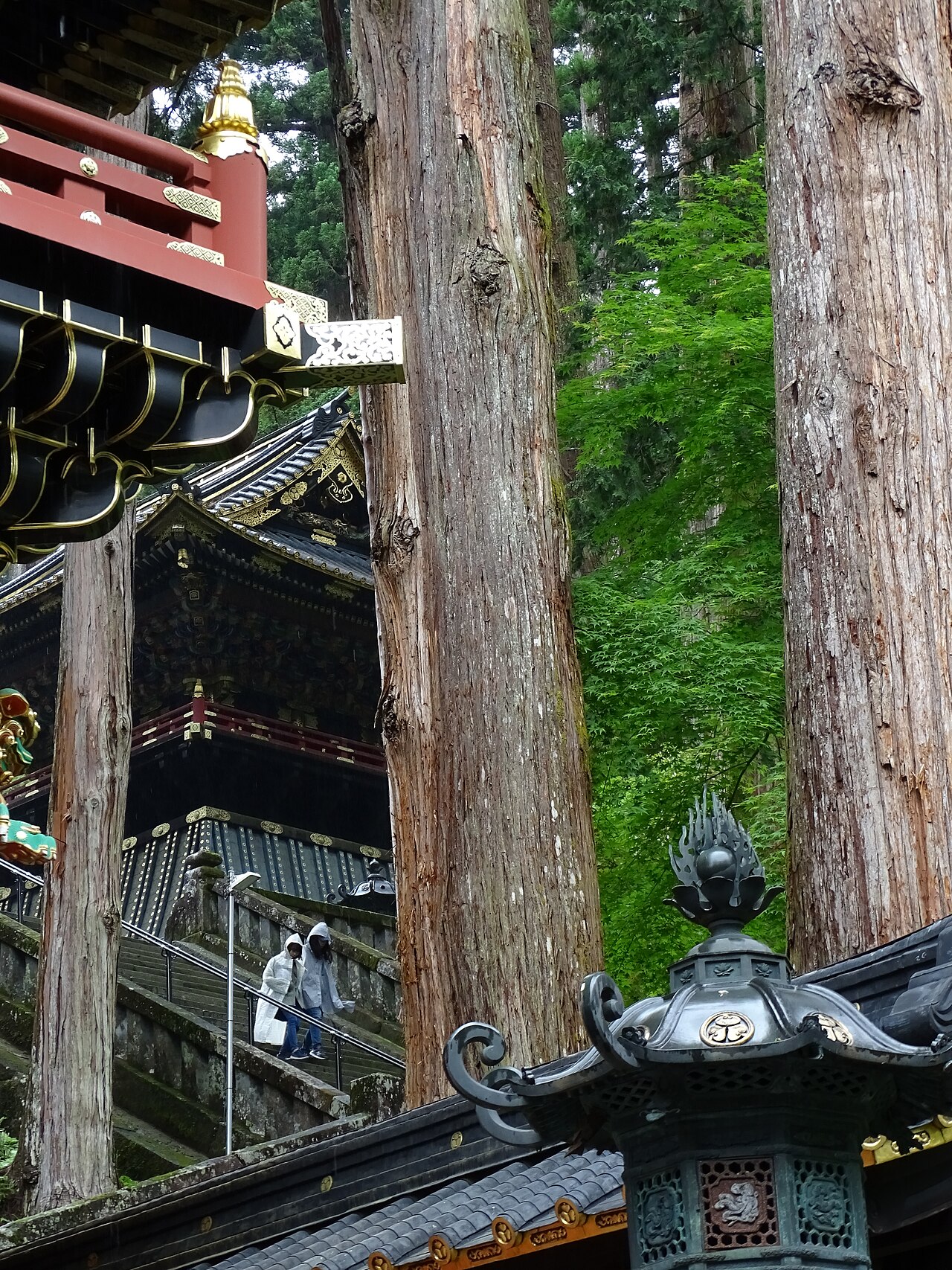 The ornate Karamon Gate at Taiyuinbyo, featuring intricate carvings and gold leaf