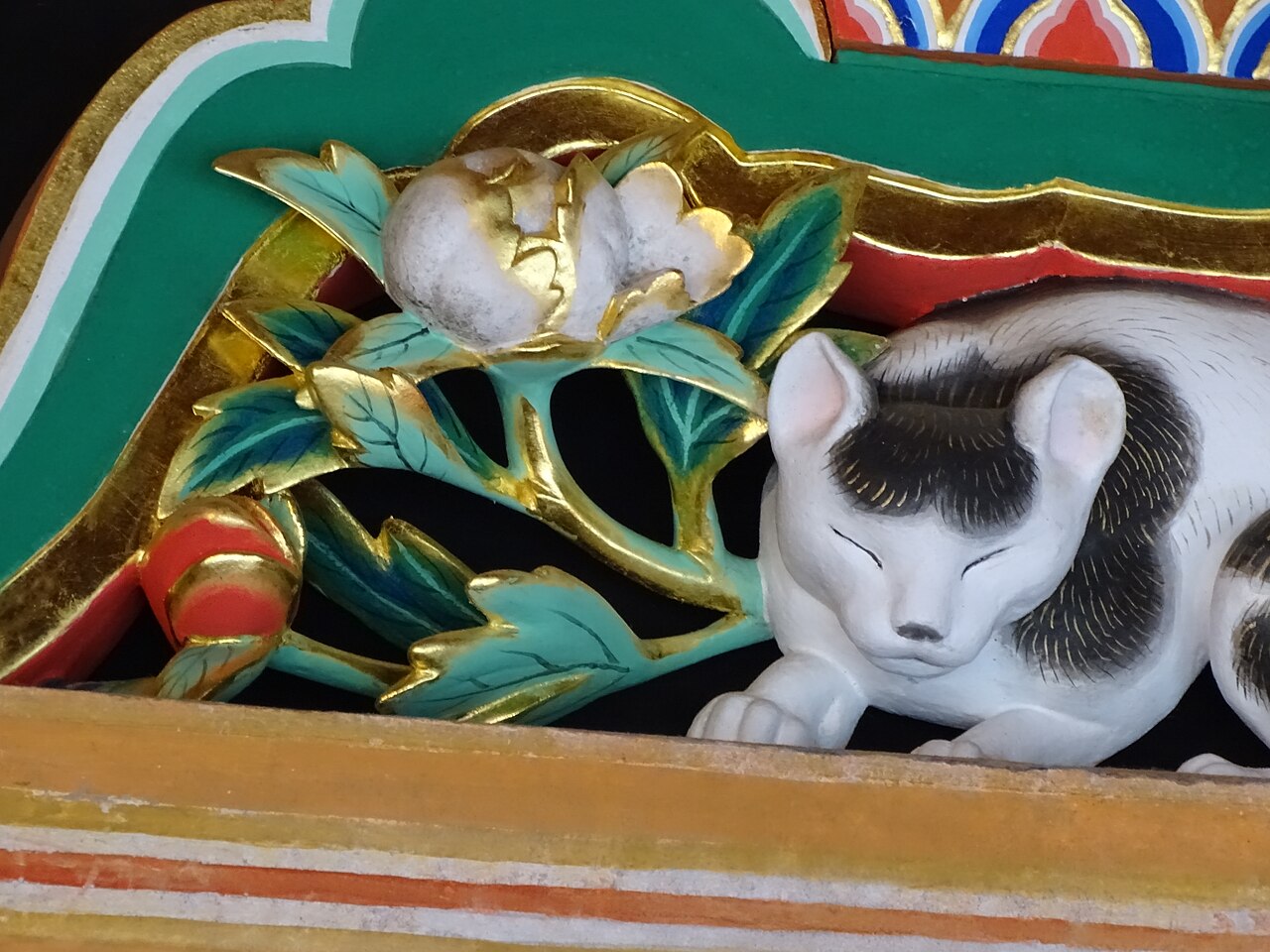 The small, famous Sleeping Cat (Nemuri-neko) carving at Nikko Toshogu Shrine