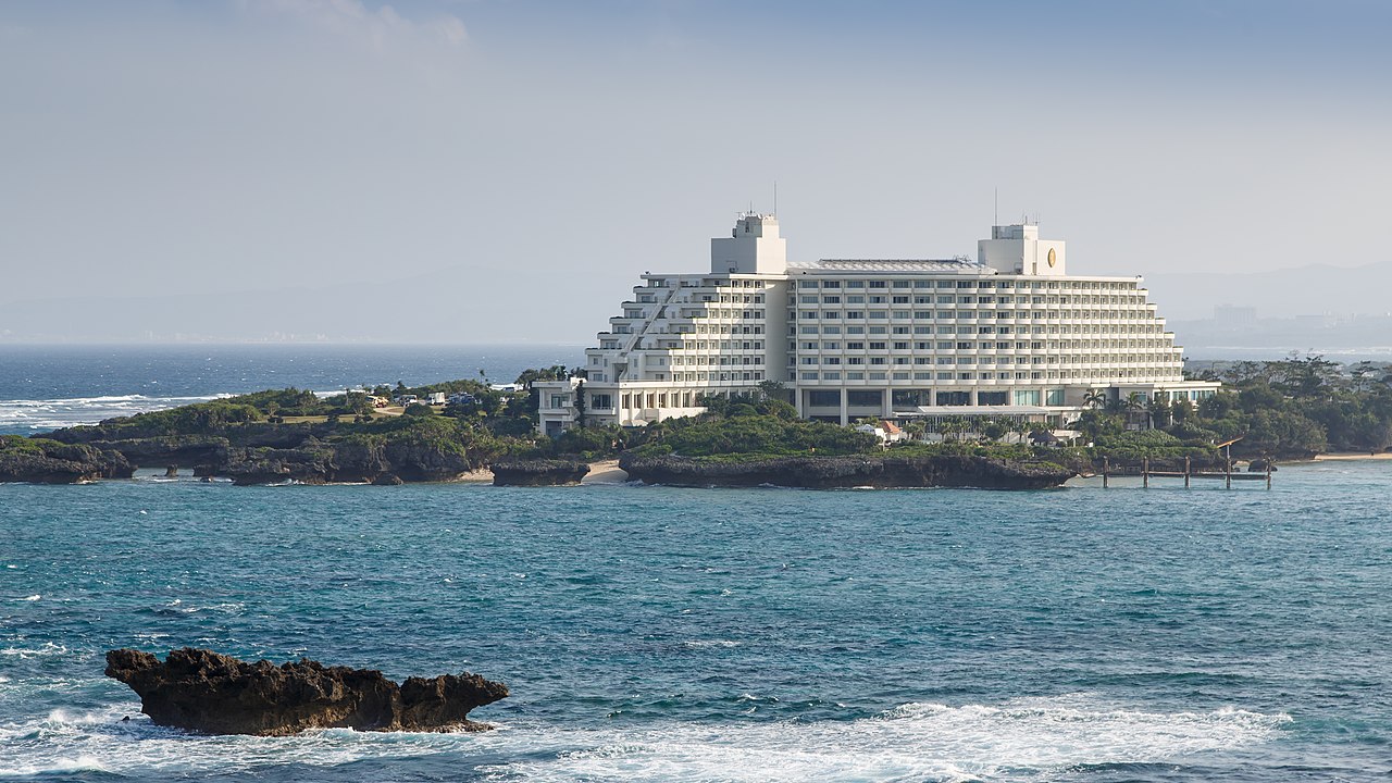 Scenic view of Manza Beach with its pristine white sand and clear turquoise water