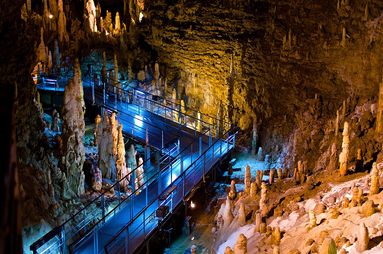 Illuminated stalactites and stalagmites inside Gyokusendo Cave at Okinawa World
