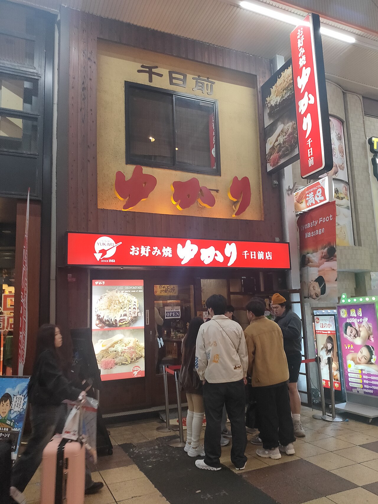 Osaka style okonomiyaki savory pancake with sauce and mayonnaise