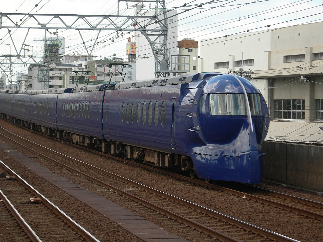 Blue streamlined Nankai Rapit train at Kansai Airport