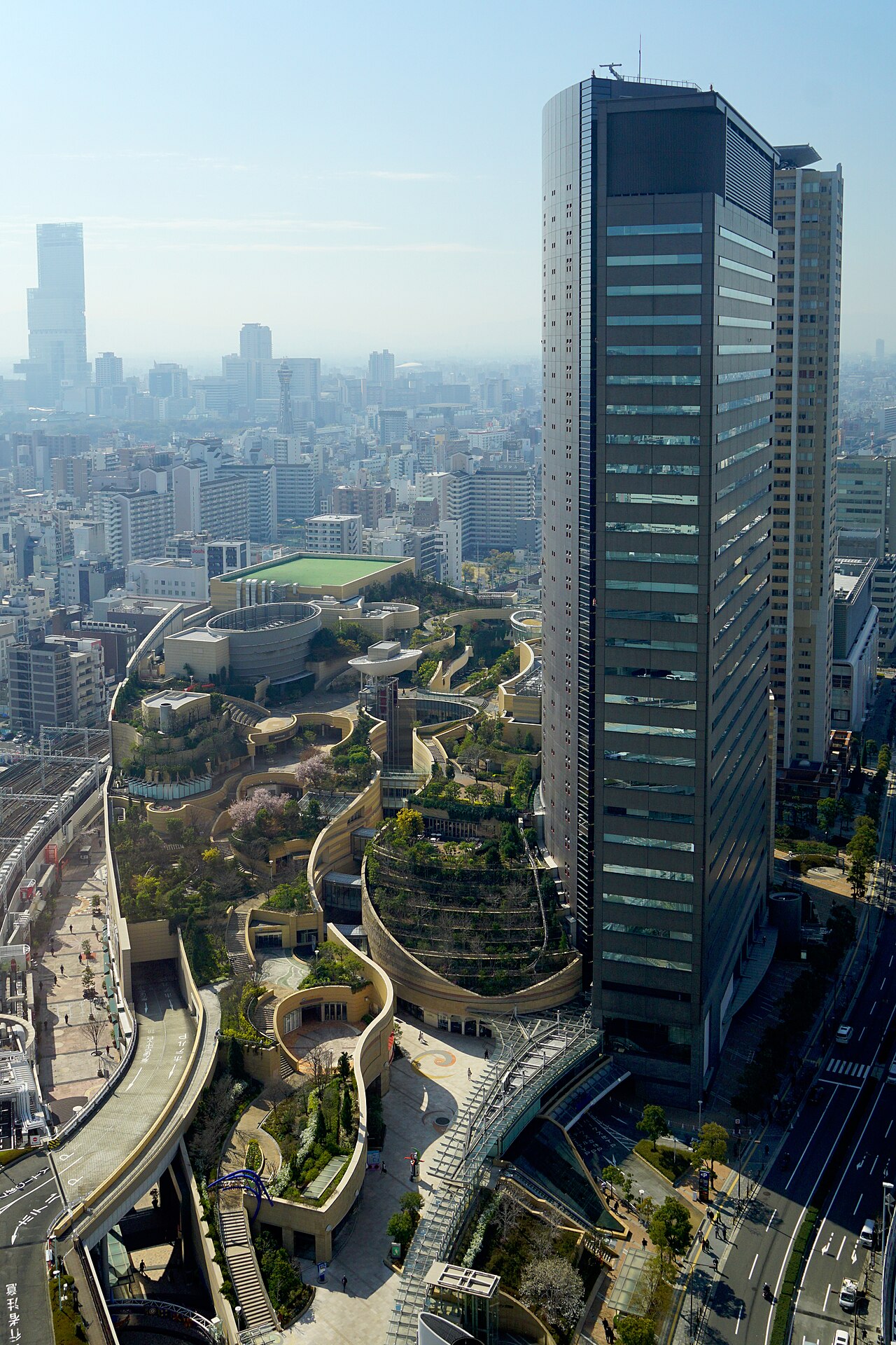 Lush terraced rooftop garden of Namba Parks shopping mall