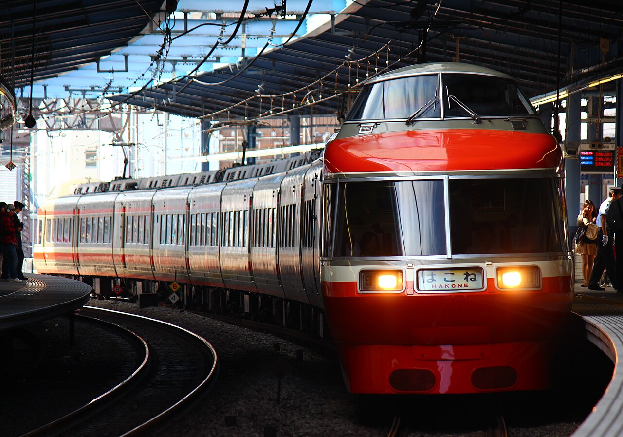 An Odakyu Romancecar train with distinctive large windows.