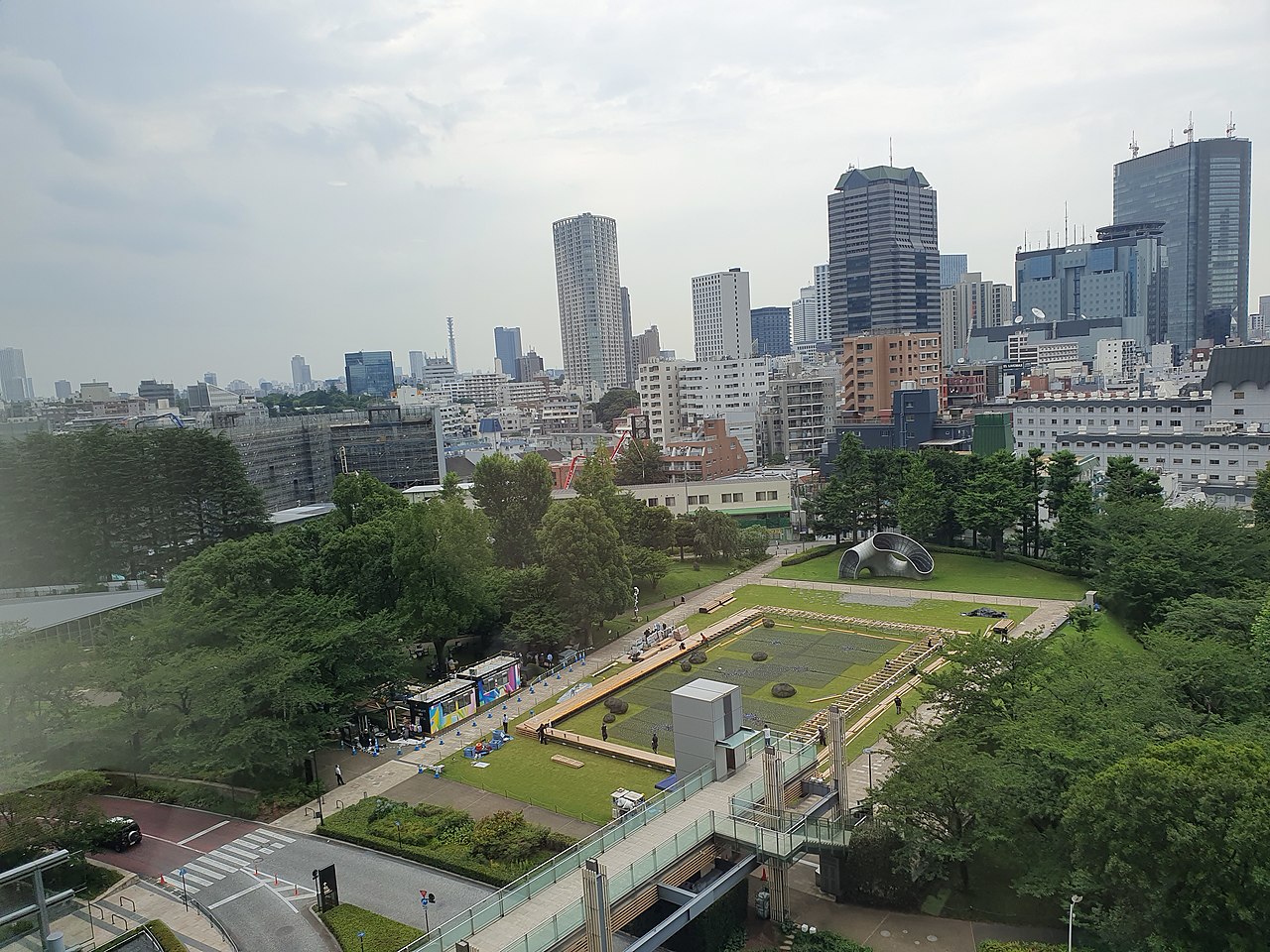 Modern architecture and green space of Tokyo Midtown's exterior plaza