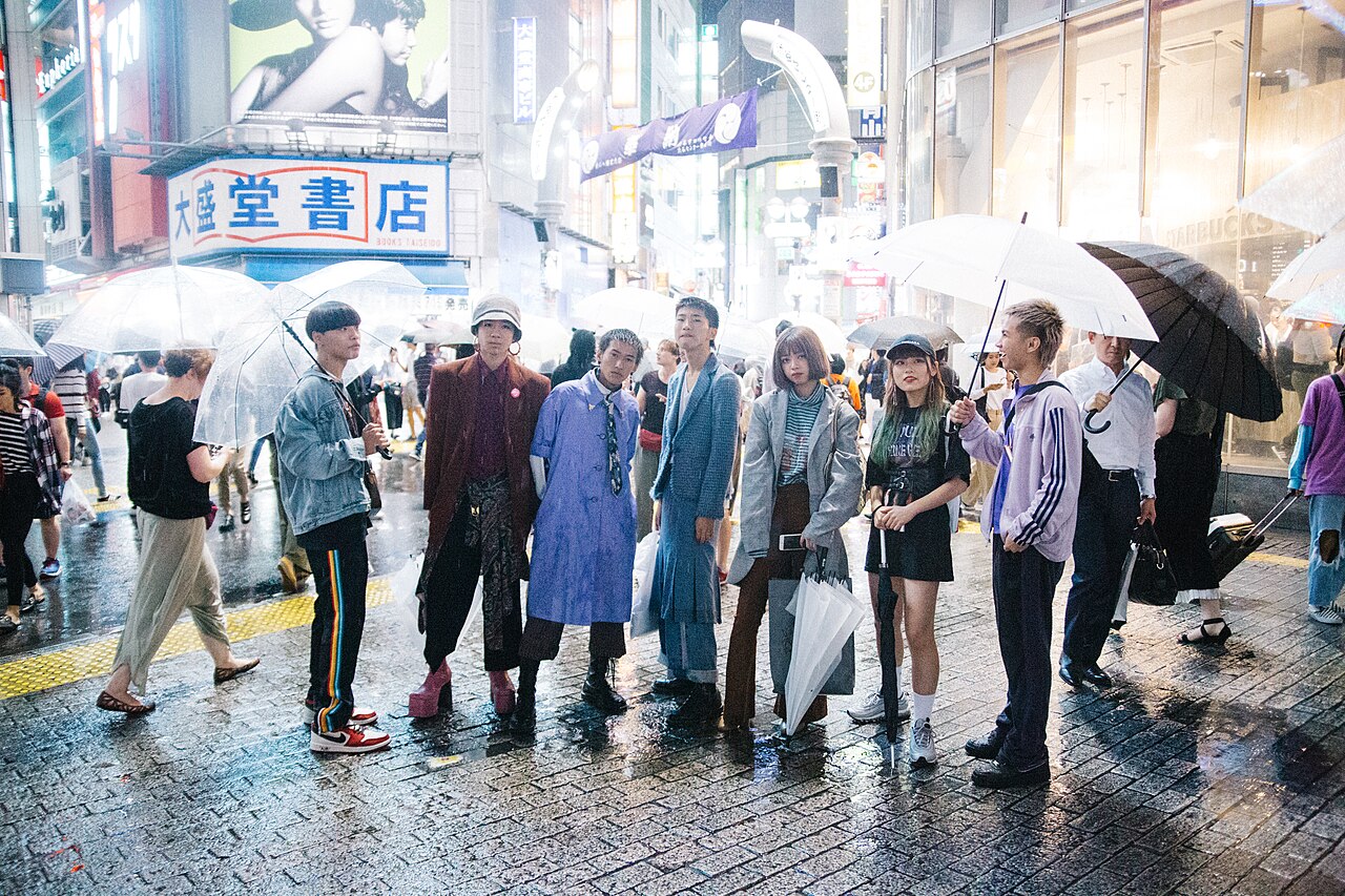 Young people walking in Shibuya, showcasing trendy street fashion