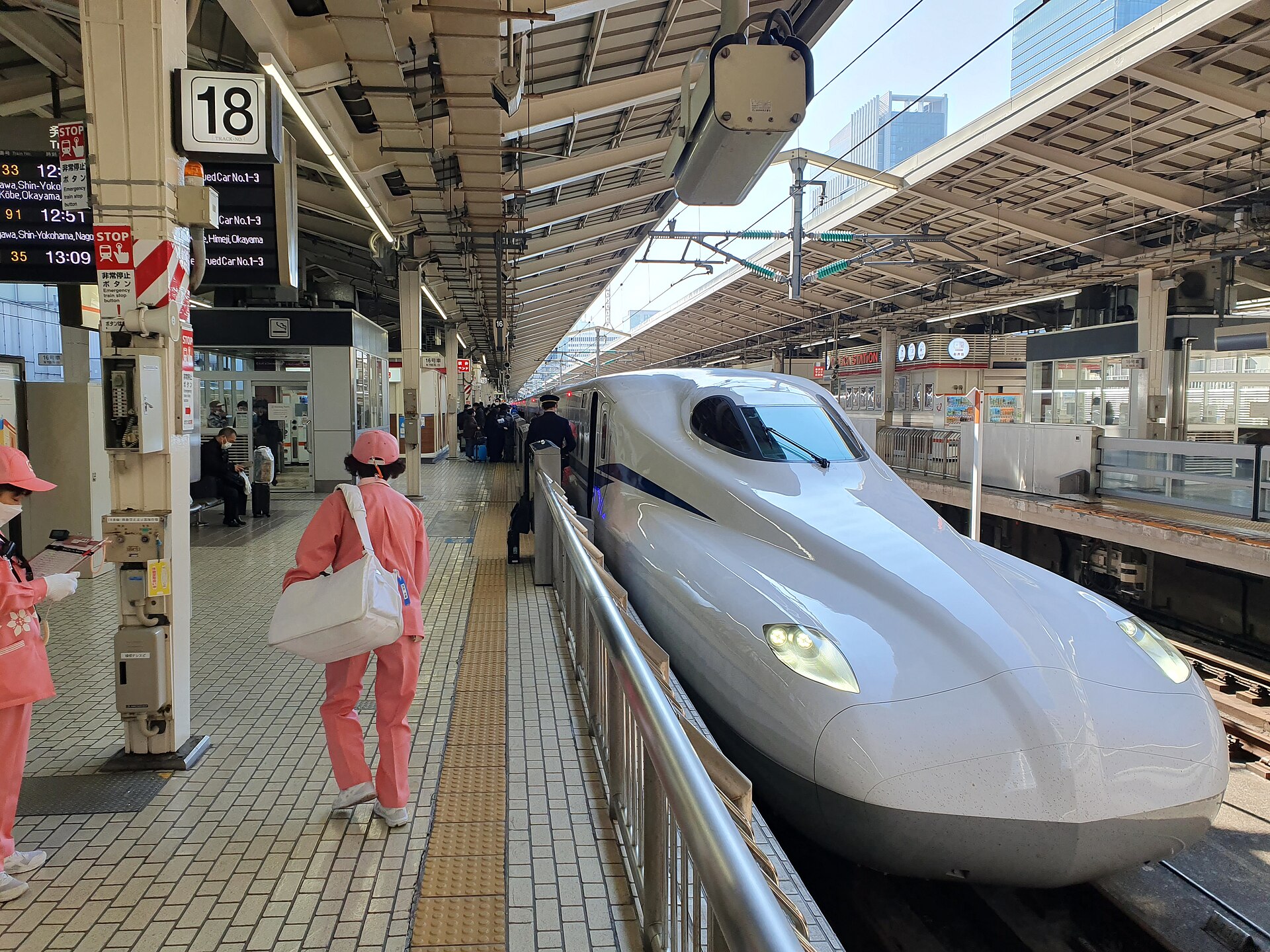 A Shinkansen train at a station platform in Japan